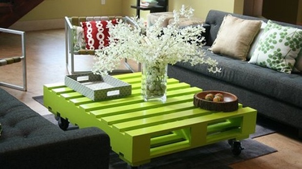 Green wooden pallet coffee table on wheels