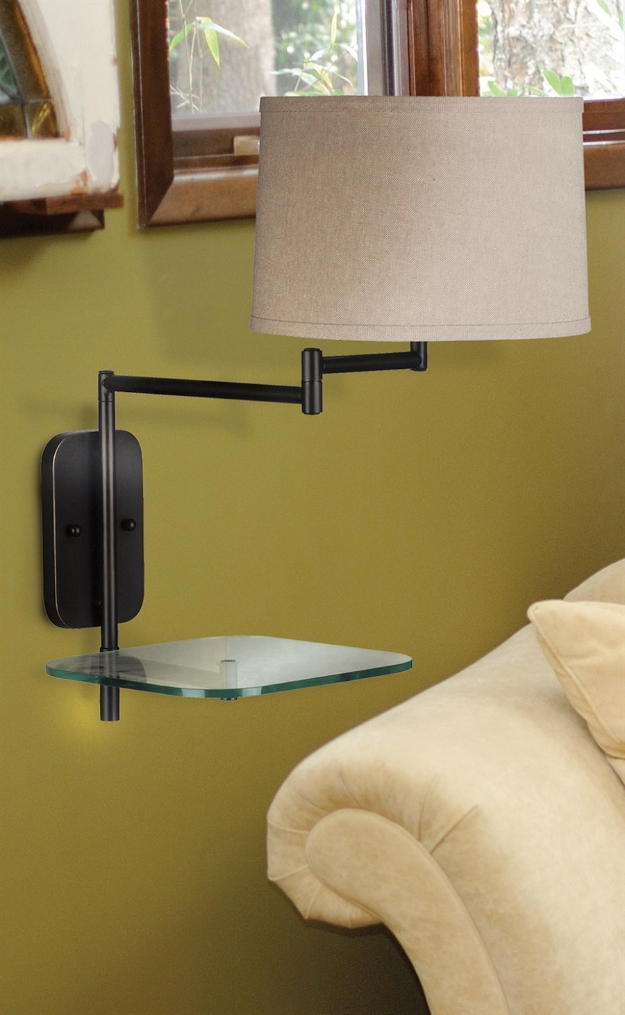 Mounted wall lamp with a swivel arm